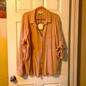 Umgee + lightweight long sleeve button up, distressed hem and split back. T111